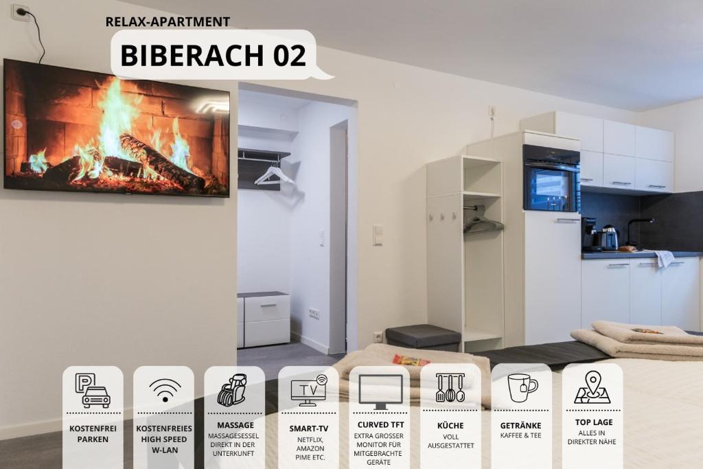 a kitchen with a fire in a room at RelaxApartment 2 Massagesessel SmartTV Küche in Biberach an der Riß