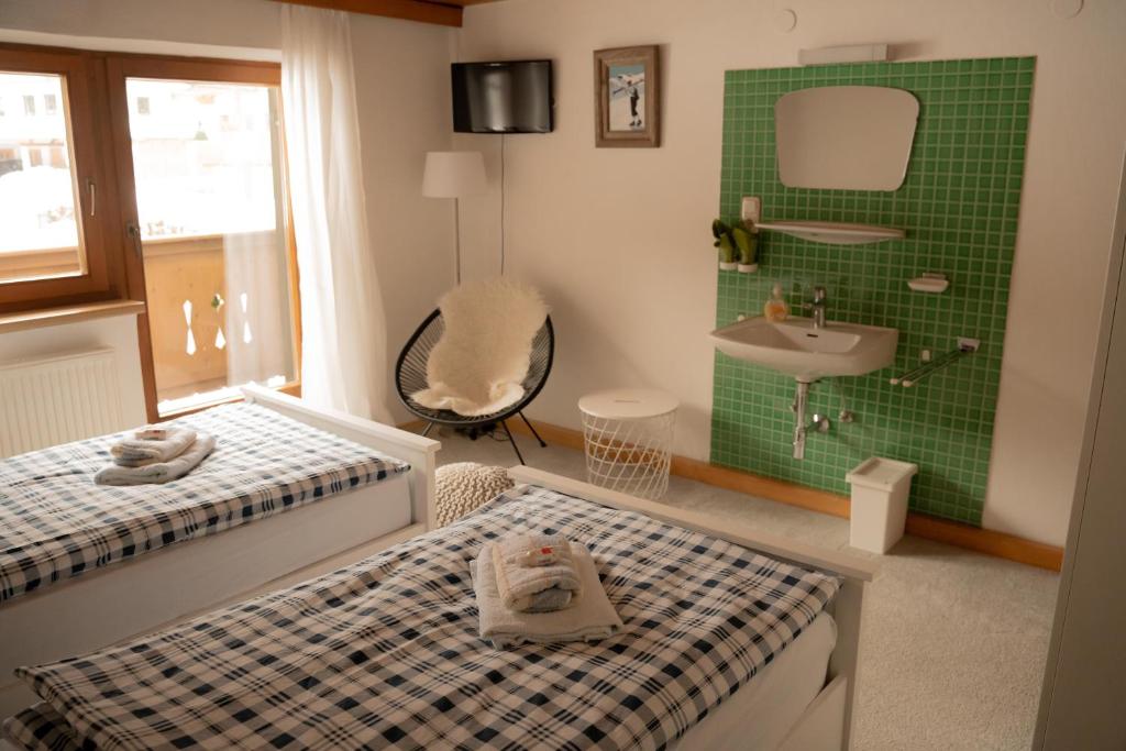 Posteľ alebo postele v izbe v ubytovaní Ferienhaus am Gebraweg in Fieberbrunn in Tirol - Saalbach, Leogang, Hochfilzen, Kitzbühel