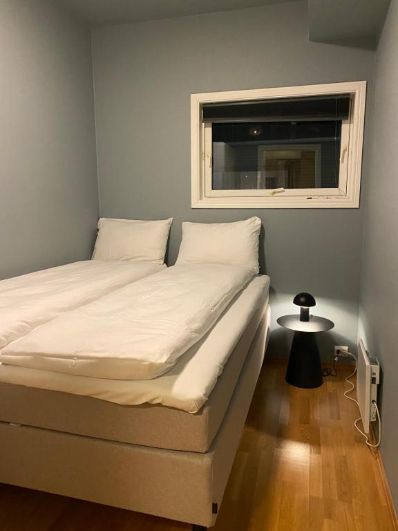 Giường trong phòng chung tại Downtown Apartment - THE VIEW