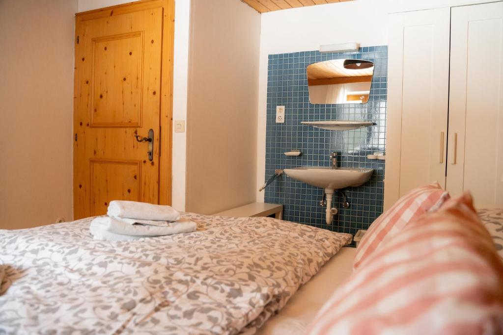Posteľ alebo postele v izbe v ubytovaní Ferienhaus am Gebraweg in Fieberbrunn in Tirol - Saalbach, Leogang, Hochfilzen, Kitzbühel