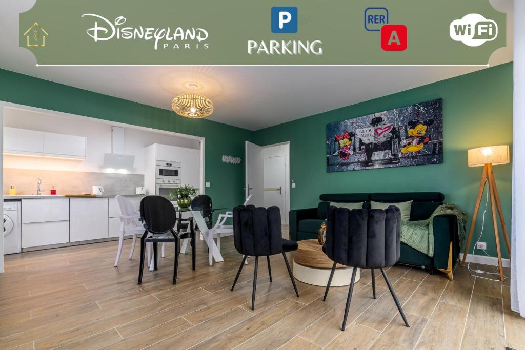 a living room with black chairs and a kitchen at Lémeraude Magic Dreams Near Disneyland in Montévrain