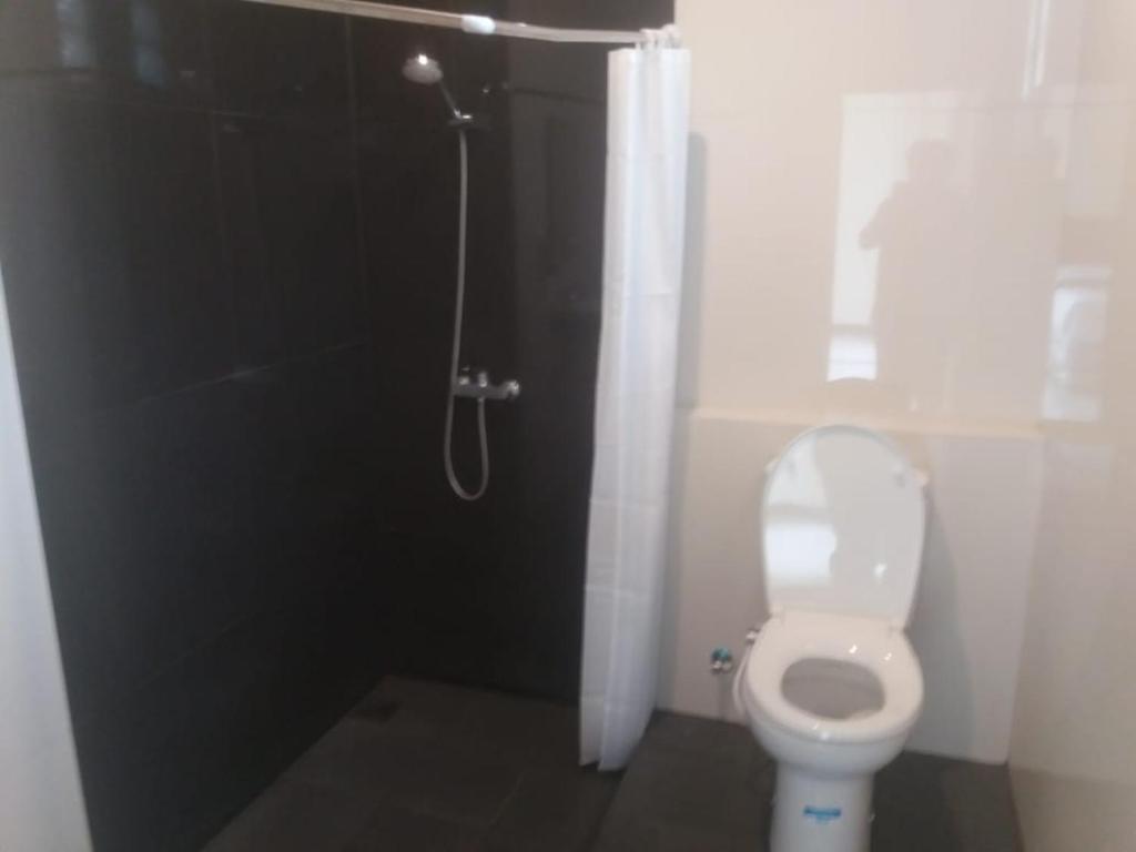 Koupelna v ubytování Hotel Bima Majalengka