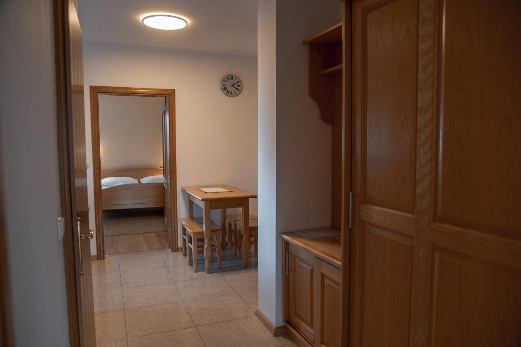 Postel nebo postele na pokoji v ubytování Rooms and Apartments Panker