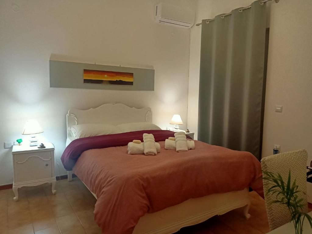 Postel nebo postele na pokoji v ubytování Smaragdas Paradise