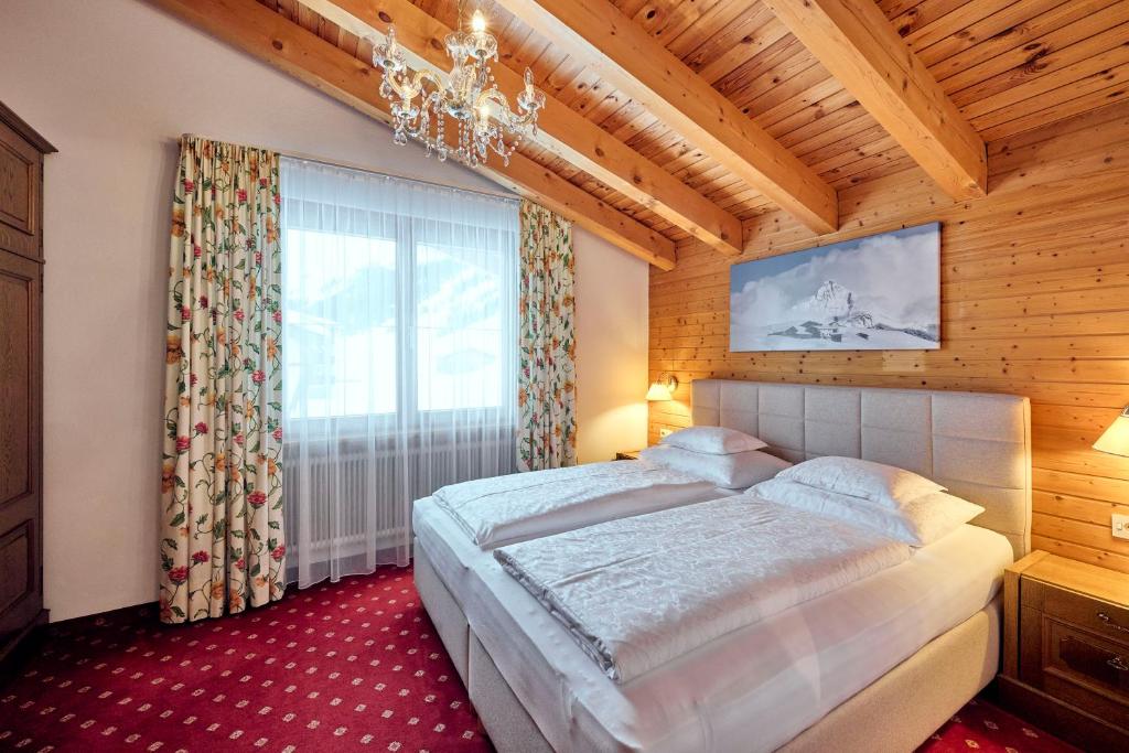 Postel nebo postele na pokoji v ubytování Appartementhaus Holiday
