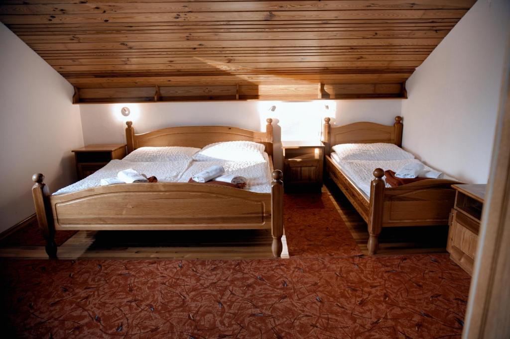 Postel nebo postele na pokoji v ubytování Rooms and Apartments Panker