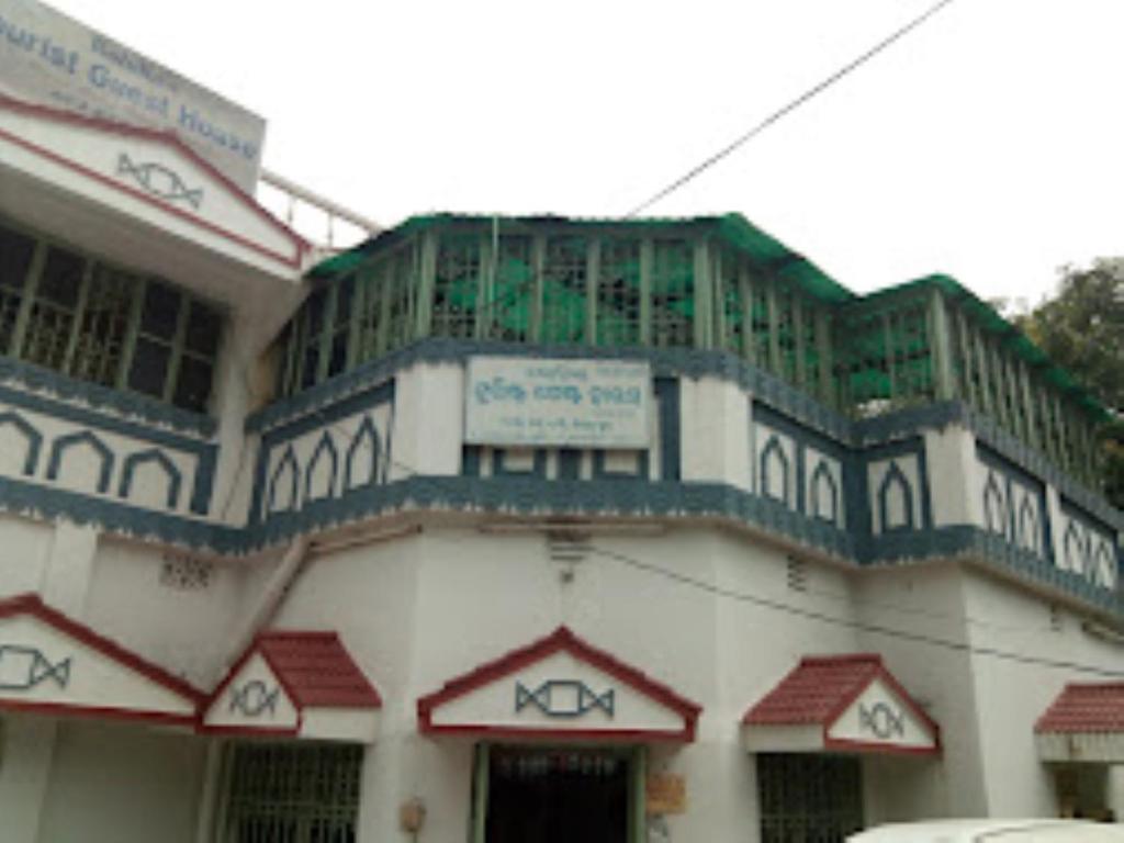 a building with blue and white trim on it at Rohilla's Tourist Guest House,Bhubaneswar in Bhubaneshwar
