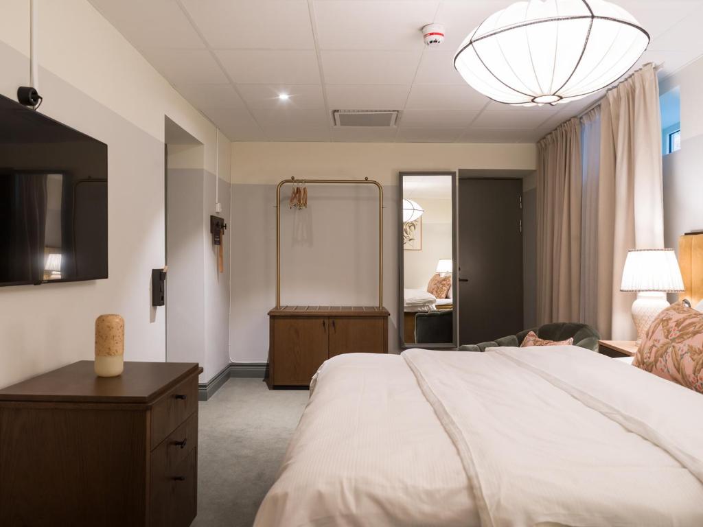 Postel nebo postele na pokoji v ubytování Elite Hotel Mårtenson