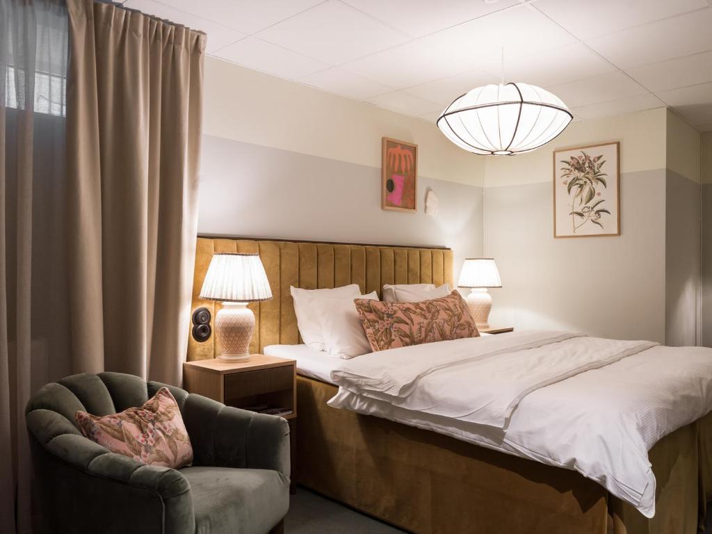 Postel nebo postele na pokoji v ubytování Elite Hotel Mårtenson