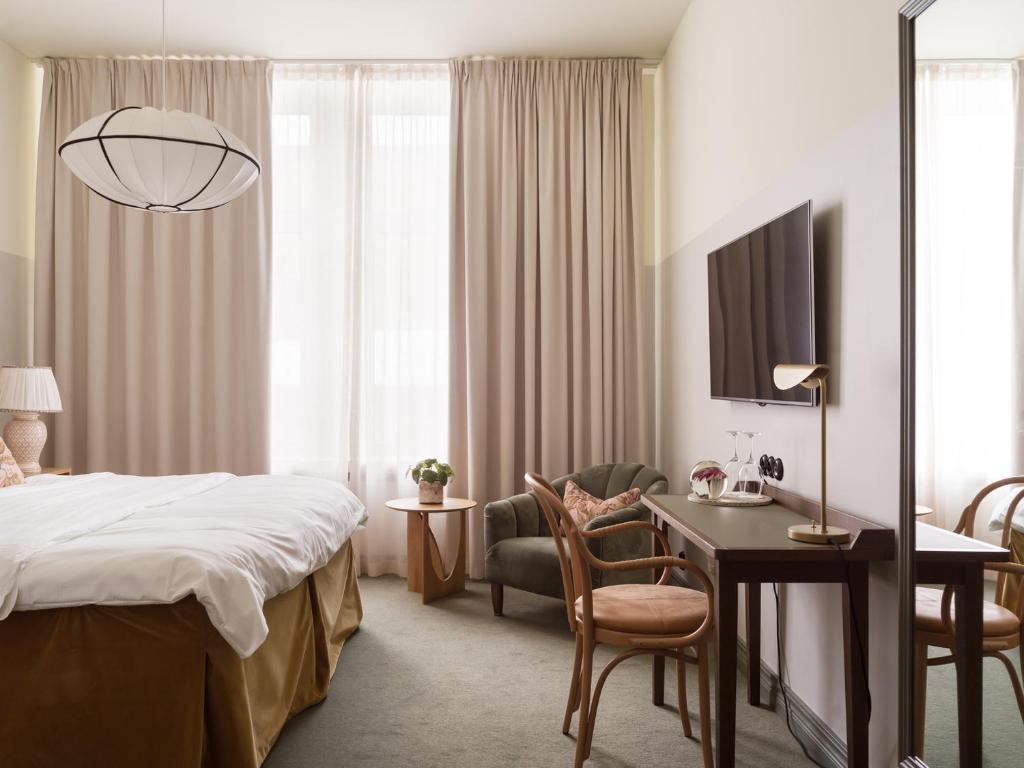 TV a/nebo společenská místnost v ubytování Elite Hotel Mårtenson