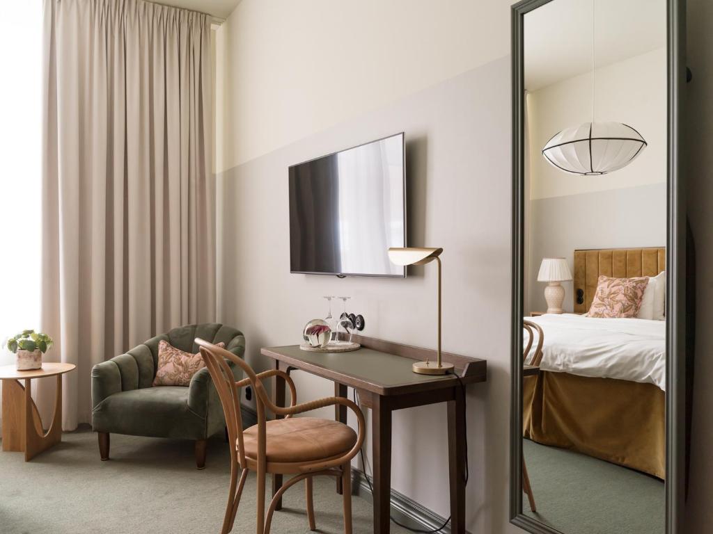 Postel nebo postele na pokoji v ubytování Elite Hotel Mårtenson