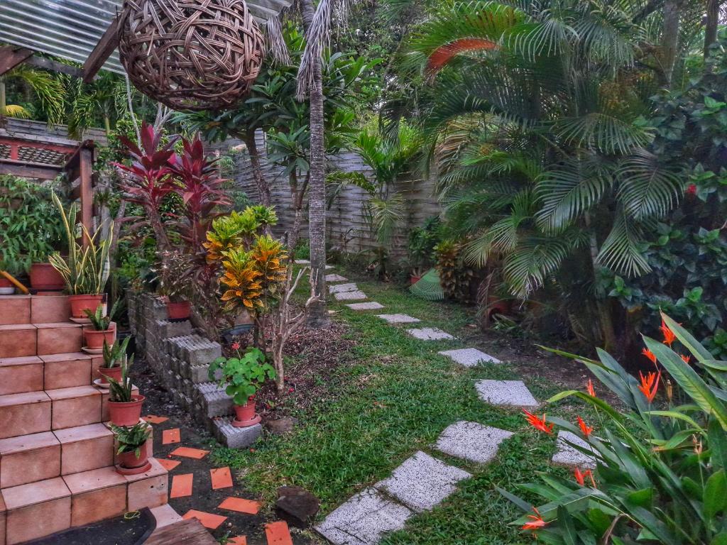 Zahrada ubytování Appartement Papay dans Villa Fleurs des Iles