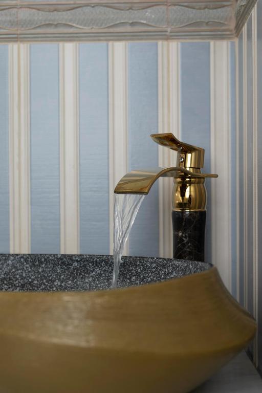 Postel nebo postele na pokoji v ubytování Medουσία Wellness Hotel & Spa