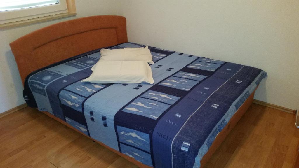 Postel nebo postele na pokoji v ubytování Apartment Alex