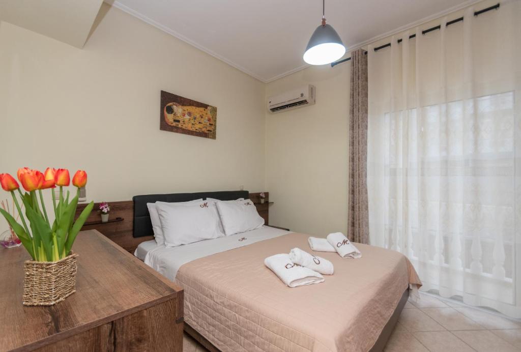 Postel nebo postele na pokoji v ubytování Mira Apartment by "elite"