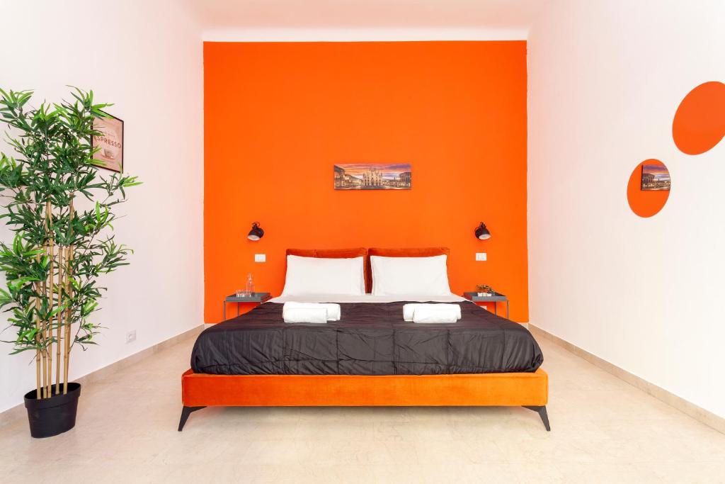 Voodi või voodid majutusasutuse [13min to Duomo] Suite Arancio vicino a City Life toas