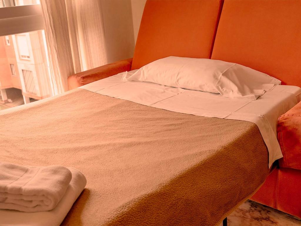 Posteľ alebo postele v izbe v ubytovaní Apartamentos Vértice Bib Rambla