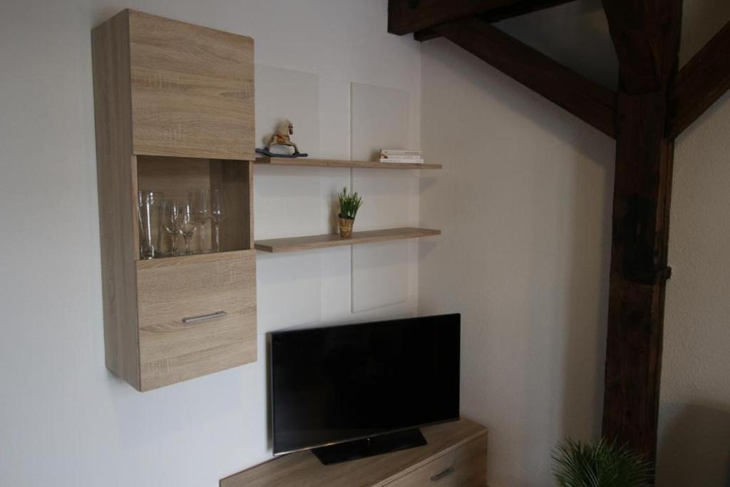 TV a/nebo společenská místnost v ubytování NEU! FeWo Fachwerkstübchen