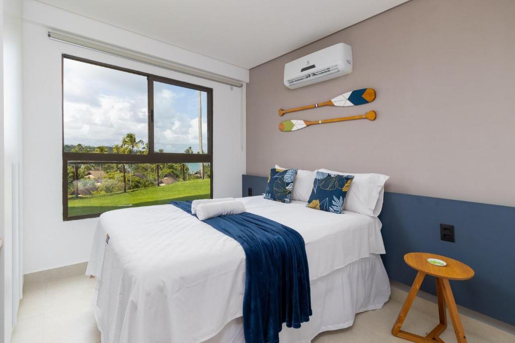 Postel nebo postele na pokoji v ubytování Apt Beira-Mar Eco Resort Praia dos Carneiros