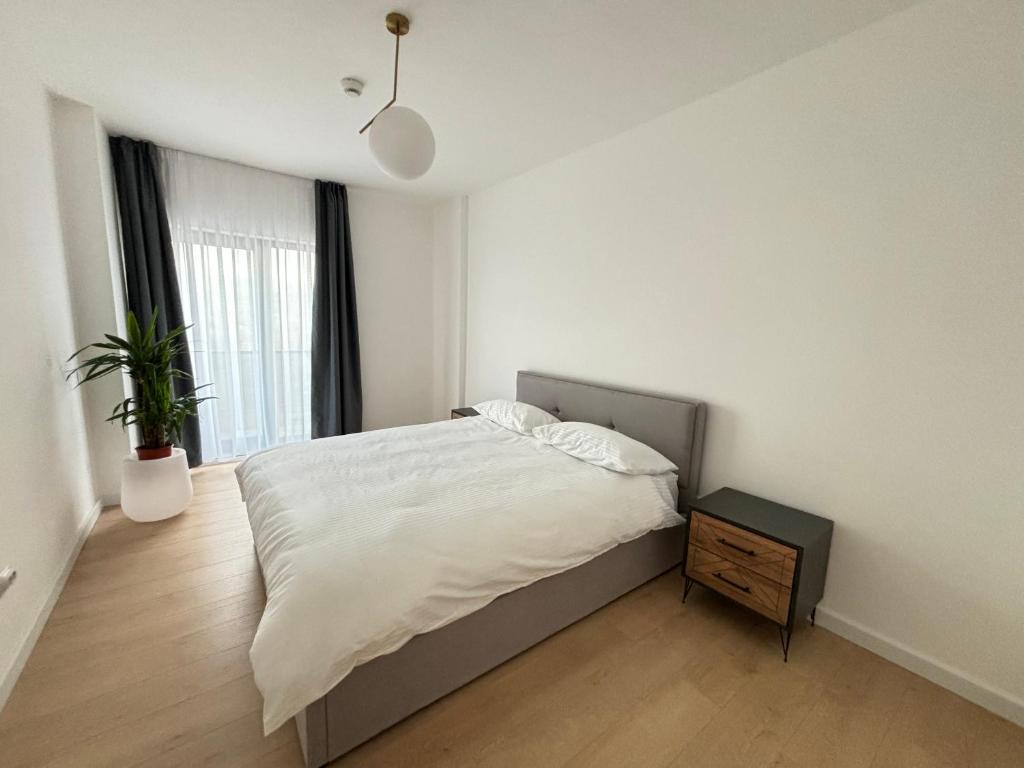 Postel nebo postele na pokoji v ubytování Exit Aparthotel