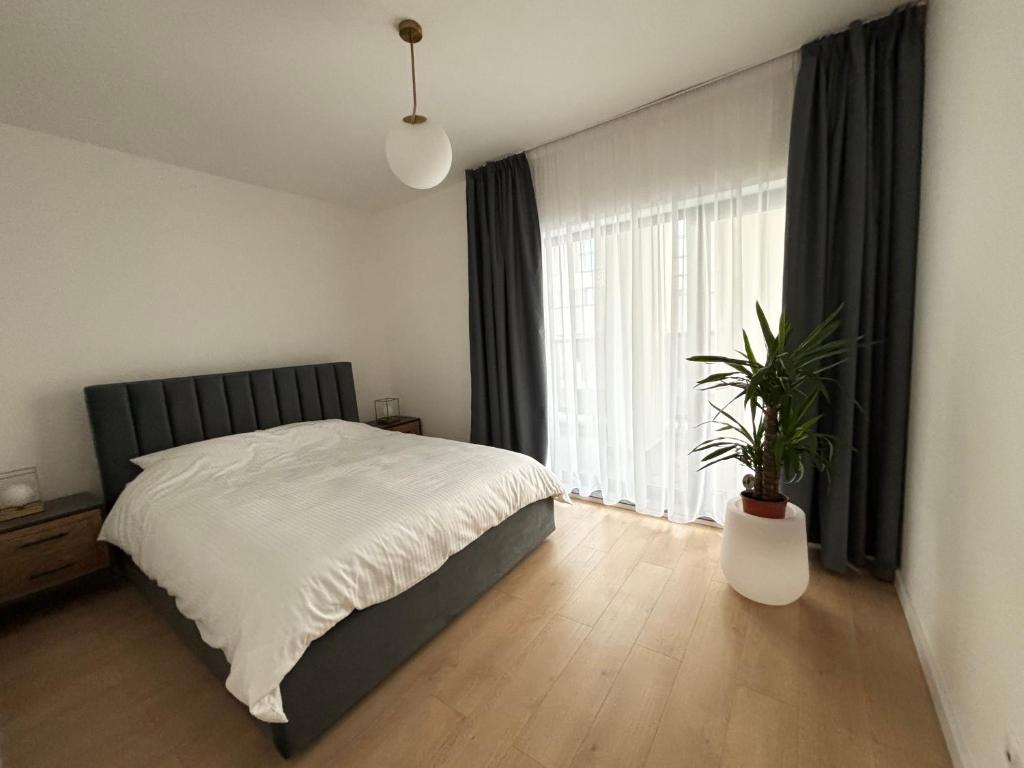 Postel nebo postele na pokoji v ubytování Exit Aparthotel
