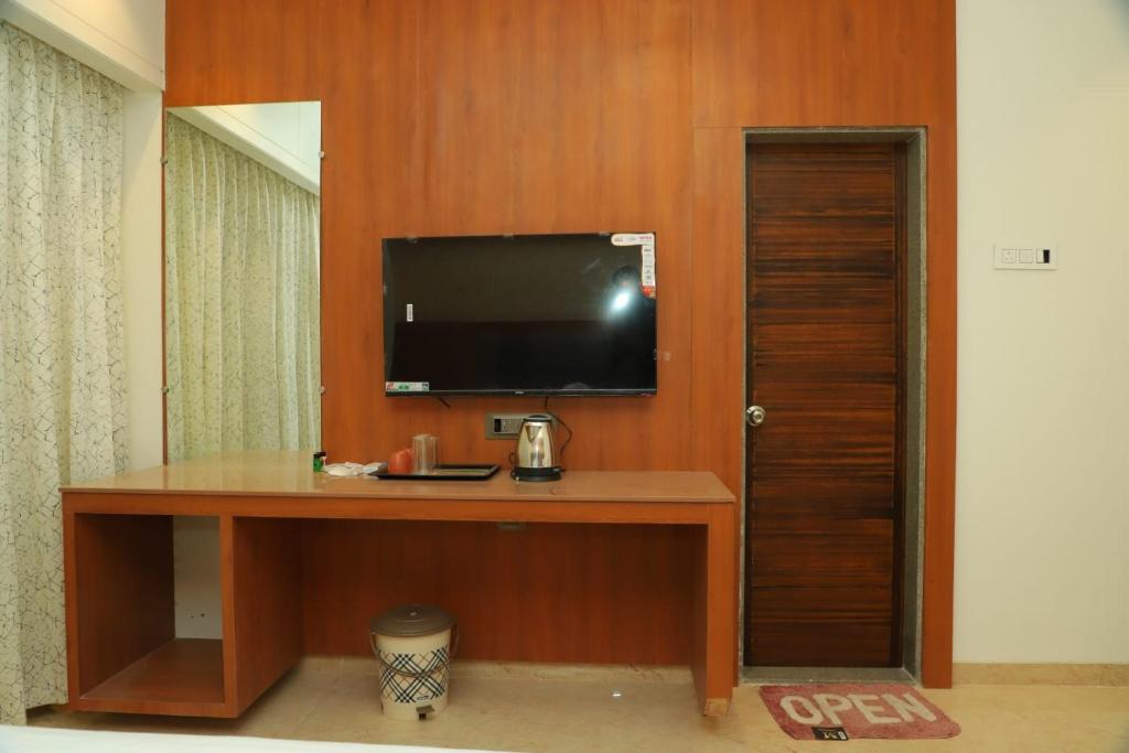 TV a/nebo společenská místnost v ubytování Hotel Sai D-lax
