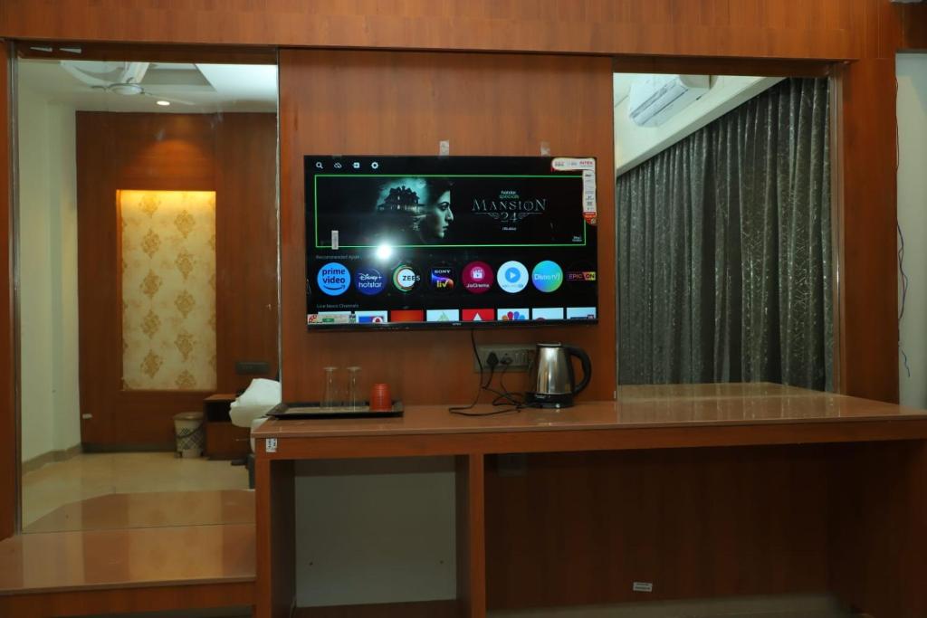 TV a/nebo společenská místnost v ubytování Hotel Sai D-lax