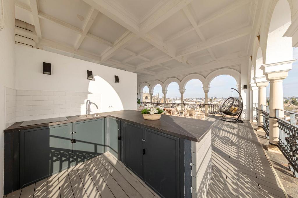 A balcony or terrace at ISG Apartments The most Exclusive apartment in Sevillaparking