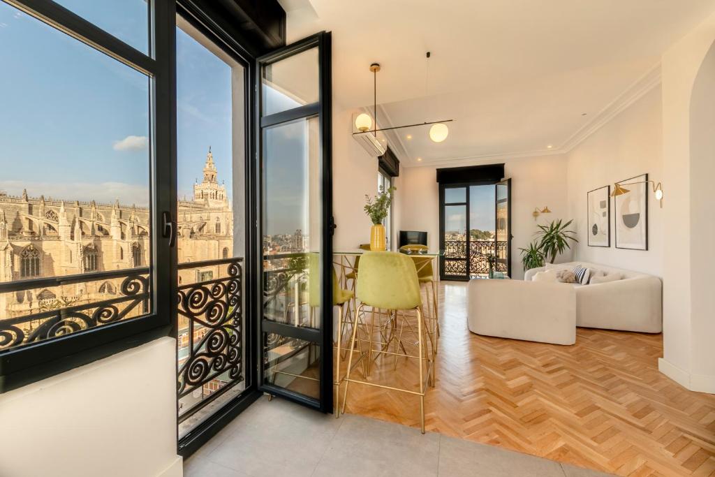 A seating area at ISG Apartments The most Exclusive apartment in Sevillaparking