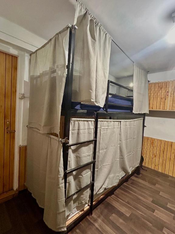 Postel nebo postele na pokoji v ubytování Tiny Spot Hostel