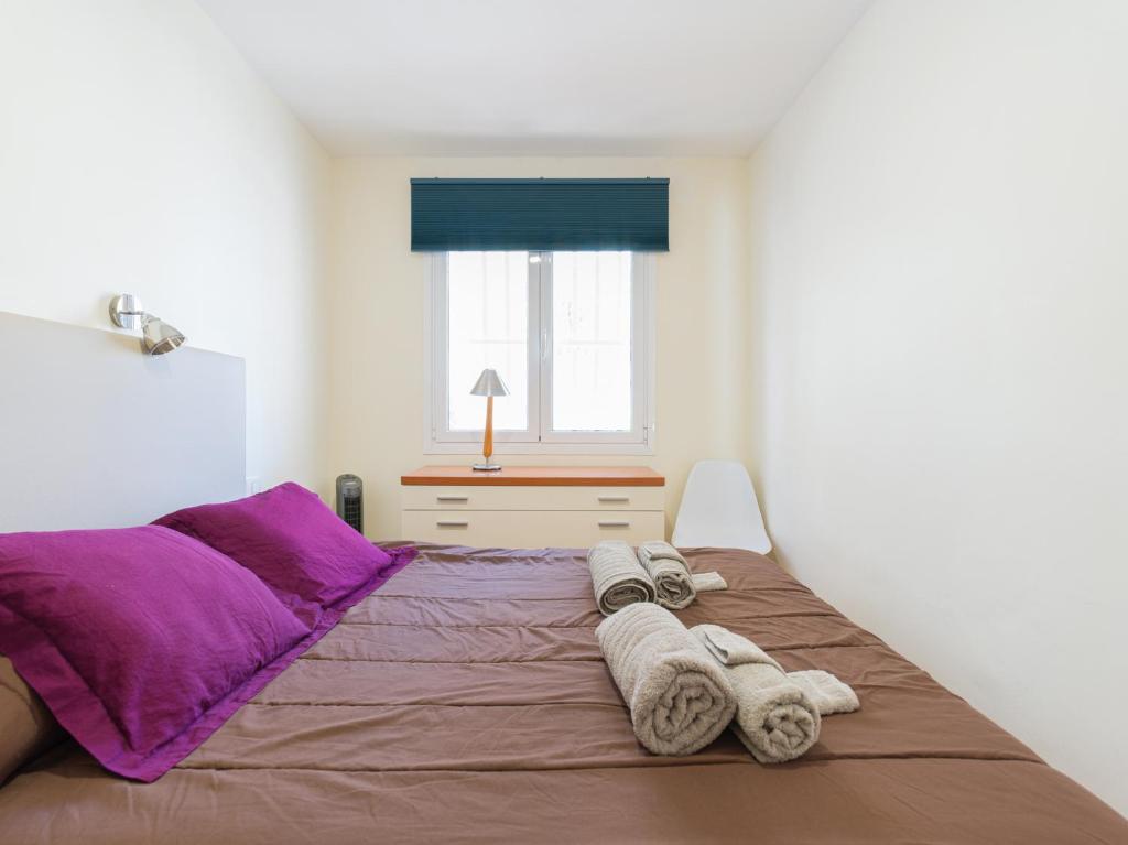 A bed or beds in a room at Lovely Peaceful Home By CanariasGetaway