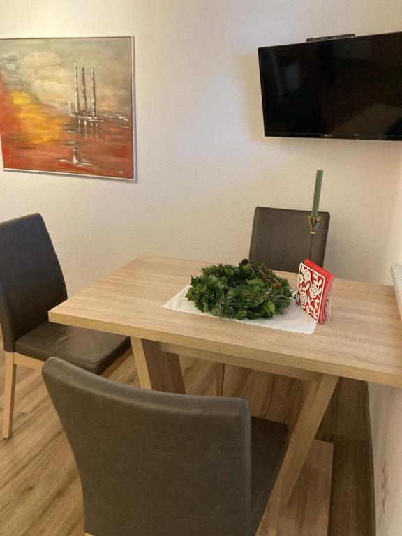 TV a/nebo společenská místnost v ubytování Gästehaus Köll