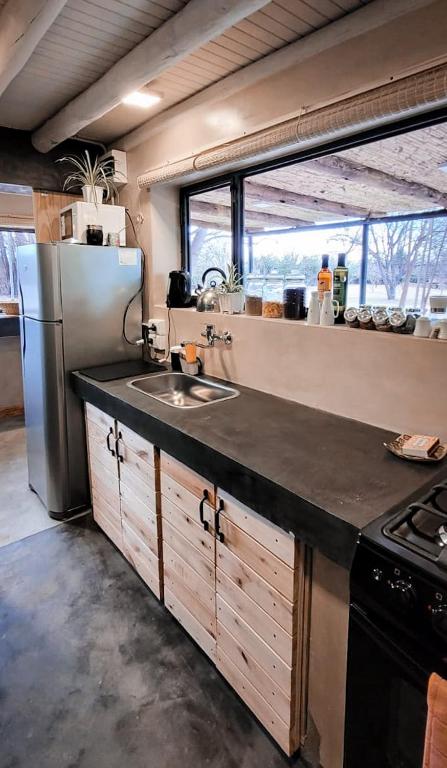 Kuchyň nebo kuchyňský kout v ubytování Finca La Saucina Casa de Campo