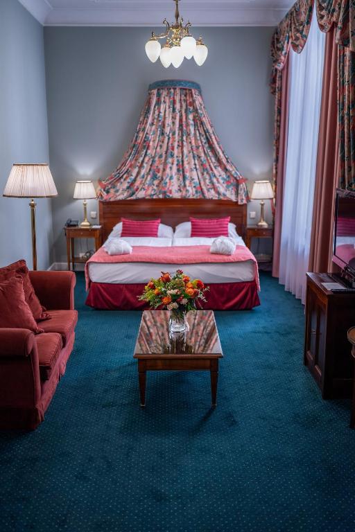 Postel nebo postele na pokoji v ubytování Hotel Liberty
