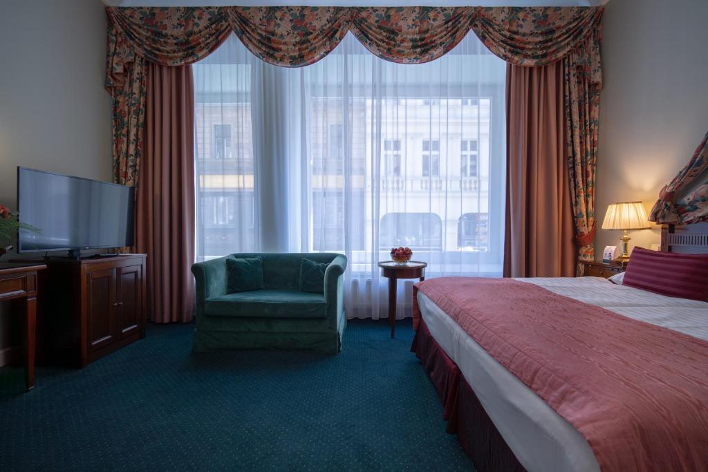 Postel nebo postele na pokoji v ubytování Hotel Liberty