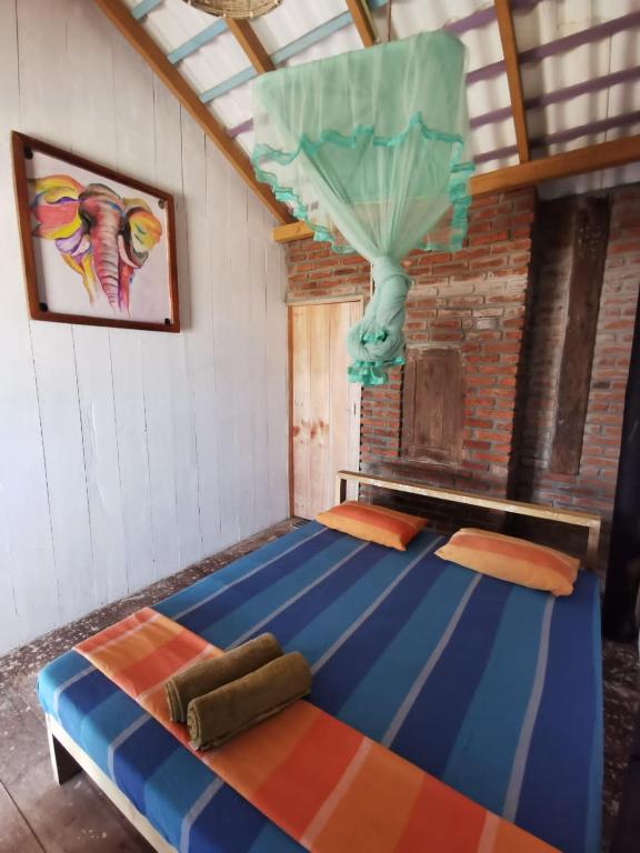 Postel nebo postele na pokoji v ubytování Amaranthe Beach Cabanas