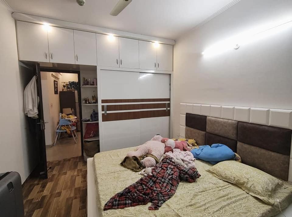 מיטה או מיטות בחדר ב-Palac Kragujevac