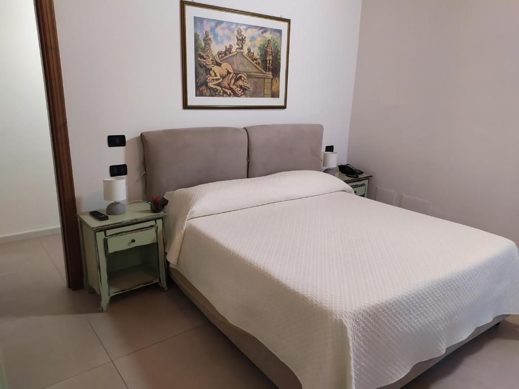 Posteľ alebo postele v izbe v ubytovaní Villa Scaduto Residence