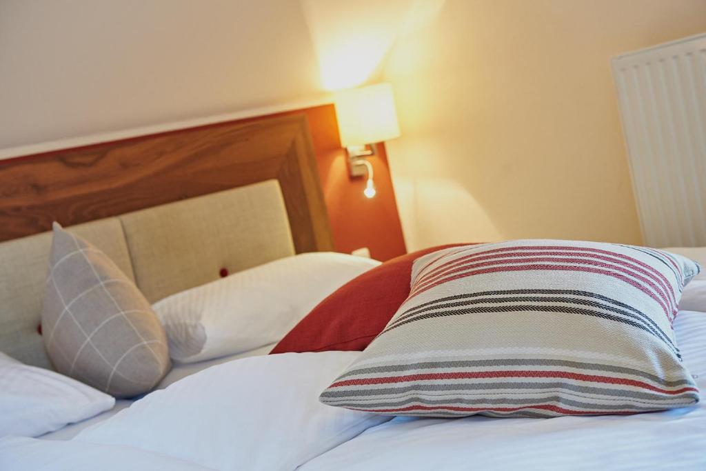Postel nebo postele na pokoji v ubytování Winzerzimmer Scharl
