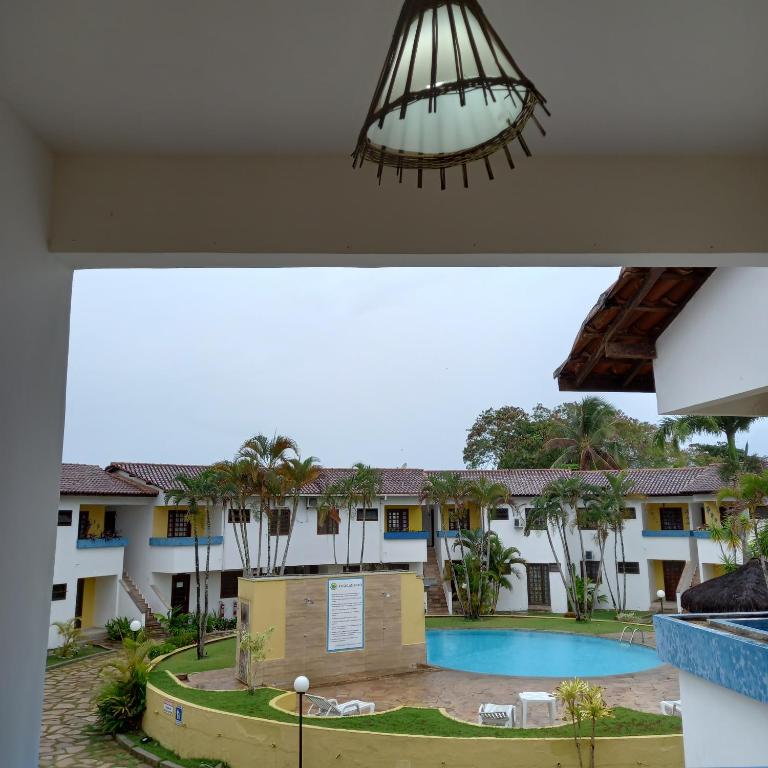 a view from the balcony of a hotel at Apartamento inteiro n.24 in Porto Seguro