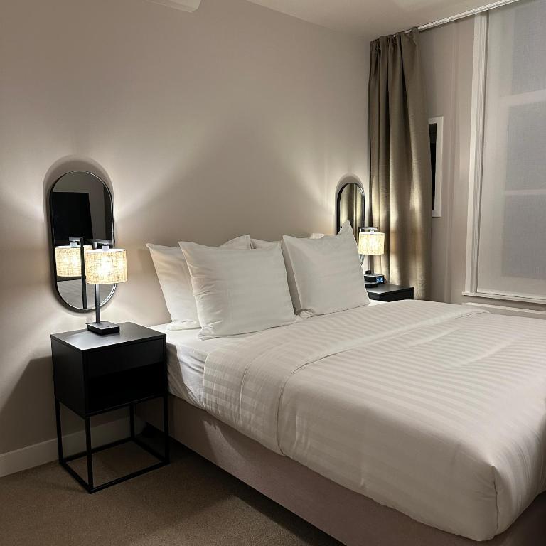 Postel nebo postele na pokoji v ubytování Hotel Grand Canal