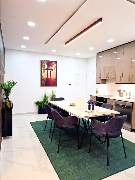 Kuchyň nebo kuchyňský kout v ubytování Sveltos Residence Suites