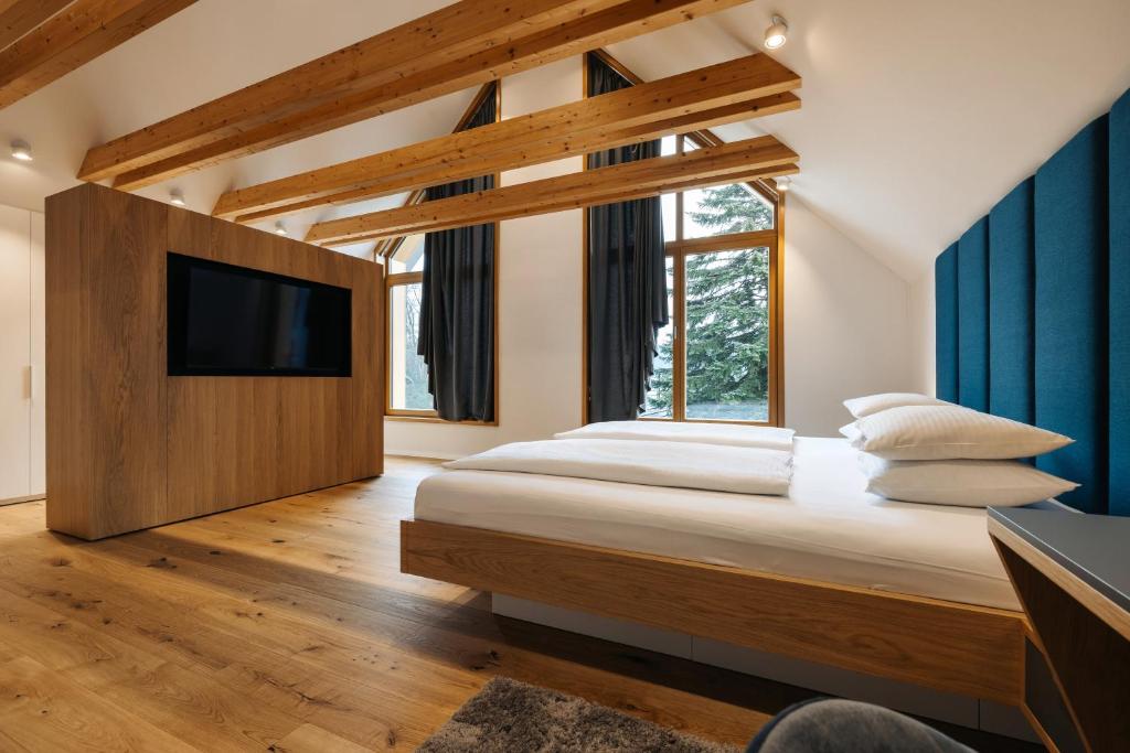 Postel nebo postele na pokoji v ubytování Ambient Resort Bled