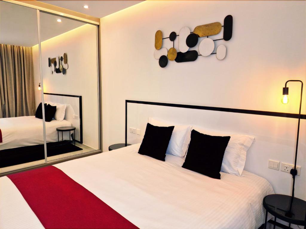 Postel nebo postele na pokoji v ubytování Sveltos Residence Suites