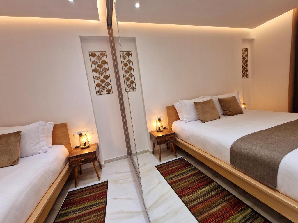 Postel nebo postele na pokoji v ubytování Sveltos Residence Suites