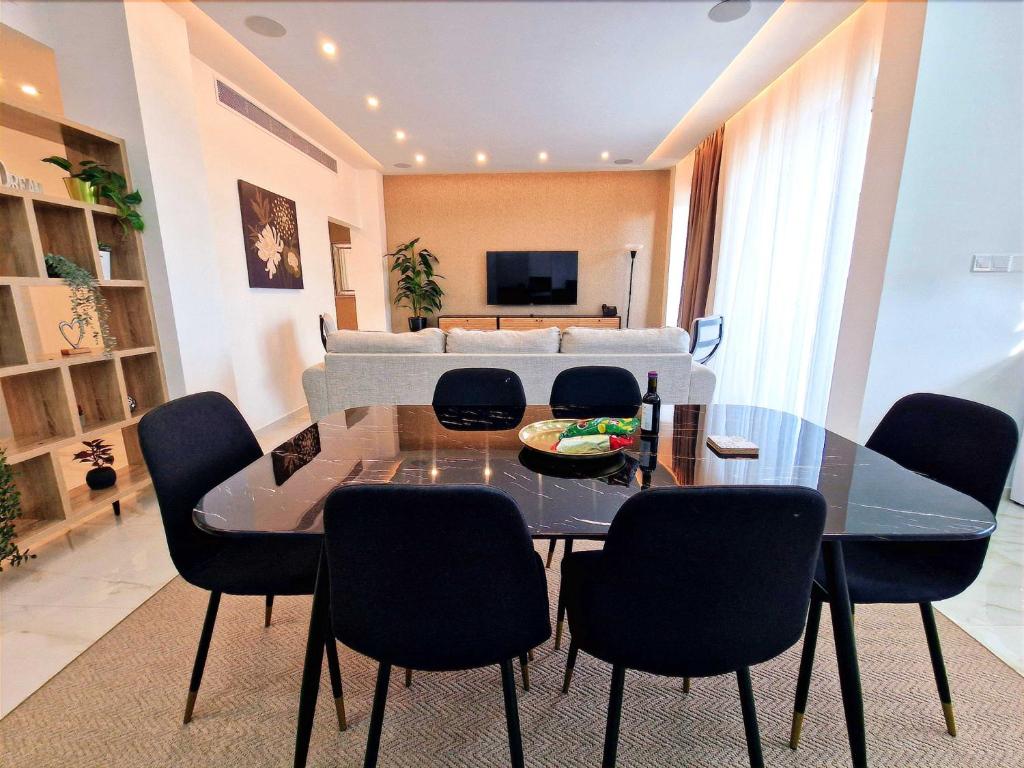 TV a/nebo společenská místnost v ubytování Sveltos Residence Suites