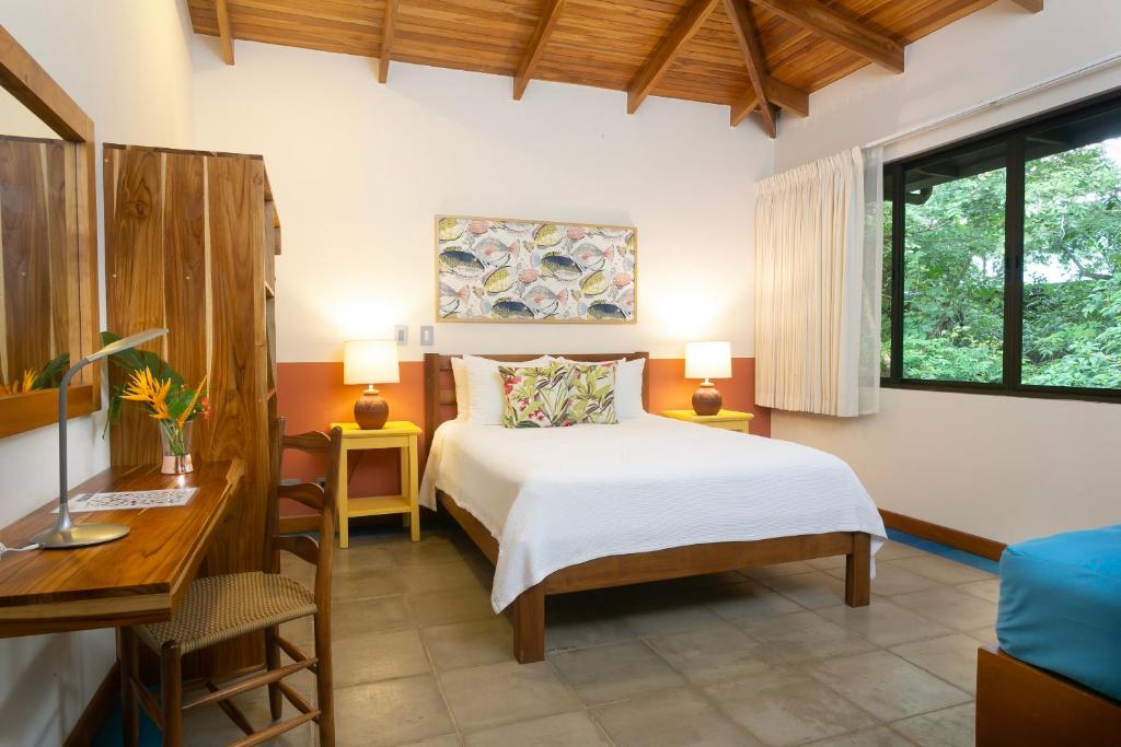Postel nebo postele na pokoji v ubytování Olas Verdes Hotel