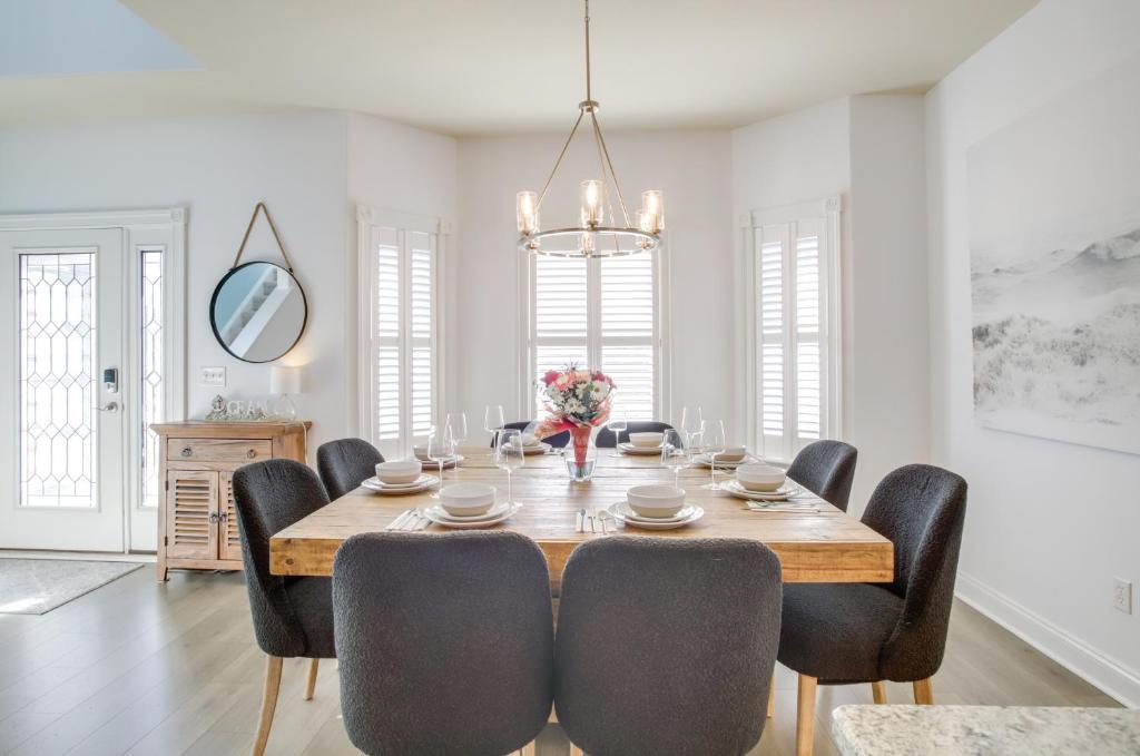 a dining room with a table and chairs at 4 Mi to Bethany Beach Frankford Getaway with Pool! in Frankford