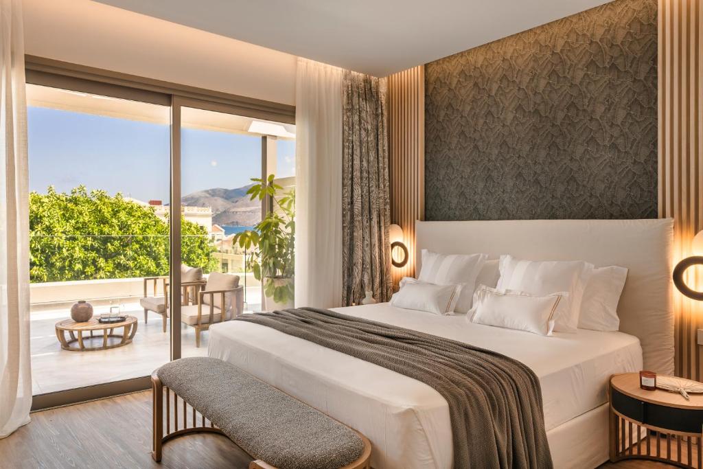 Postel nebo postele na pokoji v ubytování PIAZZA SUITES