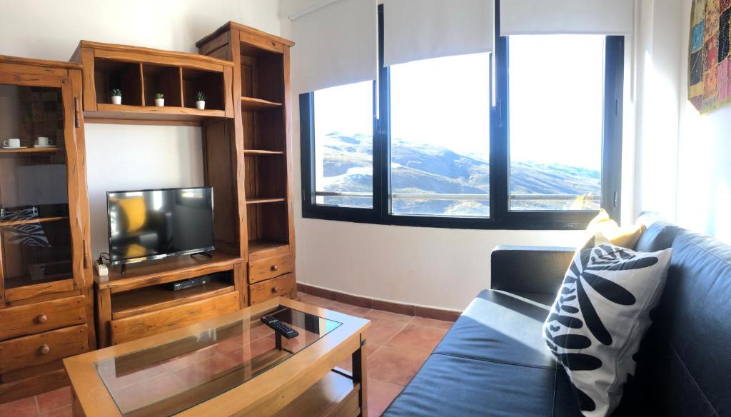 Posezení v ubytování zona media apartamento confort monte oiz